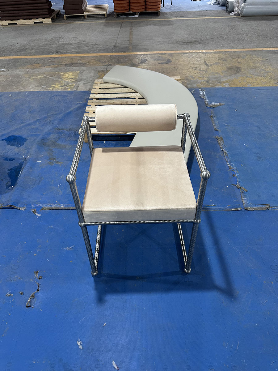 The sample chair viewed square-on in the workshop